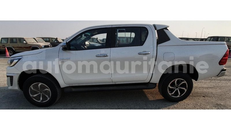 Big with watermark toyota hilux adrar import dubai 1879