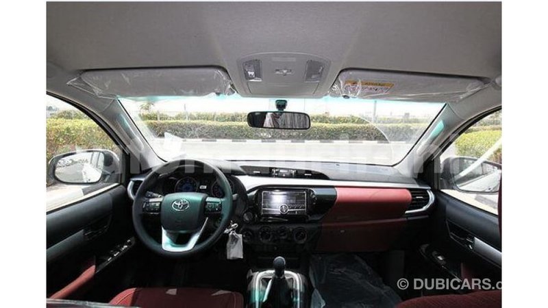 Big with watermark toyota hilux adrar import dubai 1881