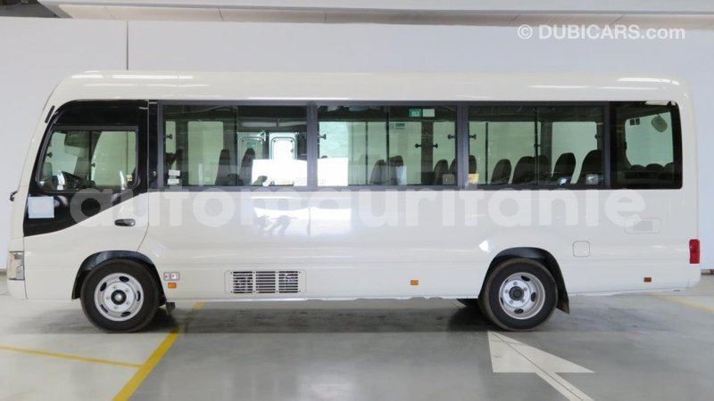 Big with watermark toyota coaster adrar import dubai 1885
