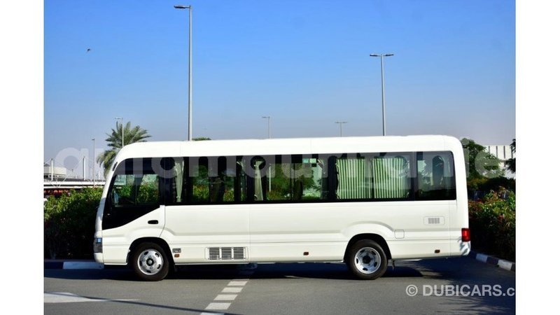 Big with watermark toyota coaster adrar import dubai 1959