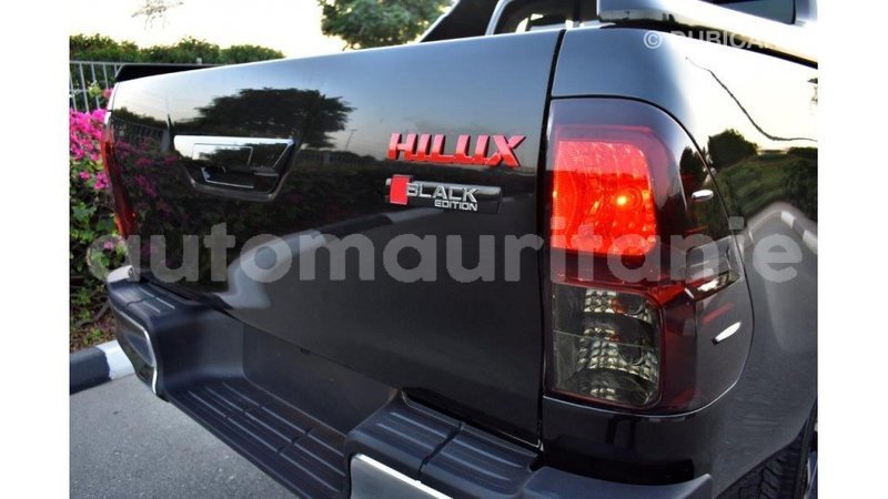 Big with watermark toyota hilux adrar import dubai 1989