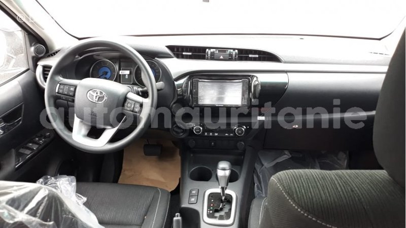 Big with watermark toyota hilux adrar import dubai 1998