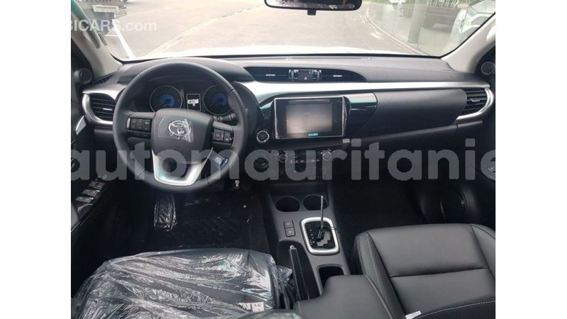 Big with watermark toyota hilux adrar import dubai 2026