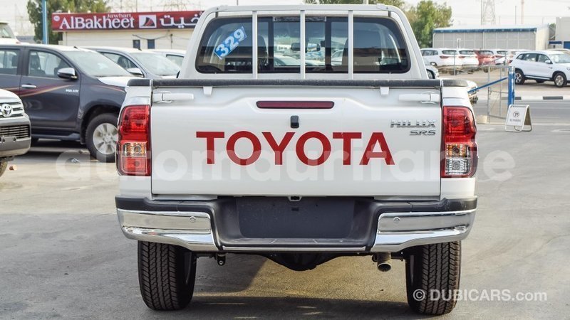 Big with watermark toyota hilux adrar import dubai 2034