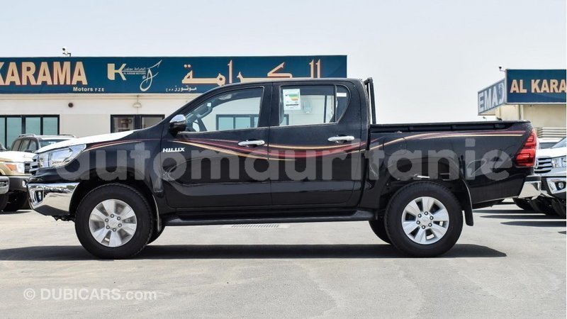 Big with watermark toyota hilux adrar import dubai 2036