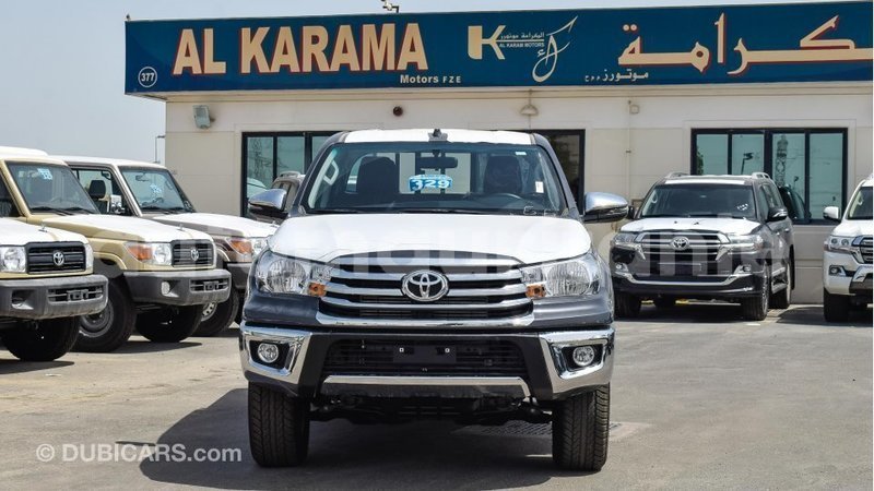 Big with watermark toyota hilux adrar import dubai 2037