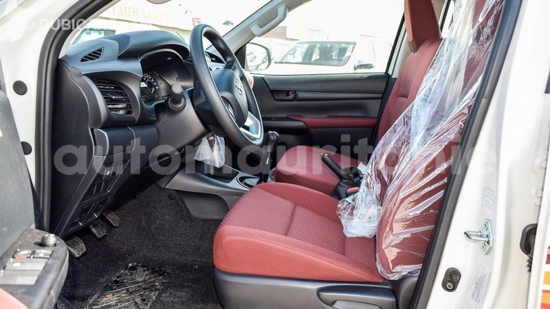 Big with watermark toyota hilux adrar import dubai 2099