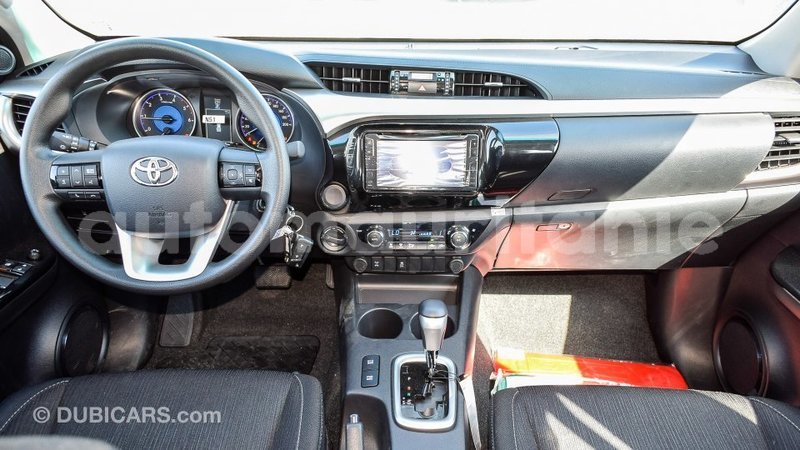 Big with watermark toyota hilux adrar import dubai 2102