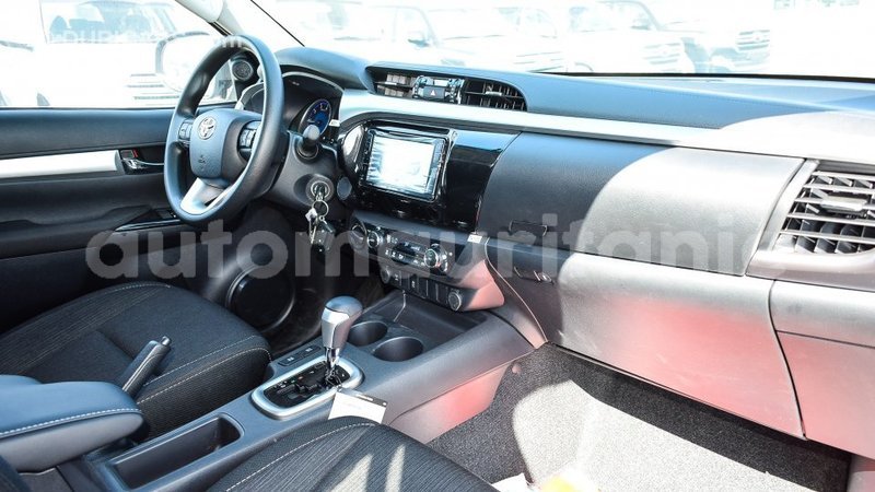 Big with watermark toyota hilux adrar import dubai 2102