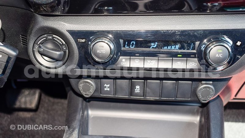 Big with watermark toyota hilux adrar import dubai 2102