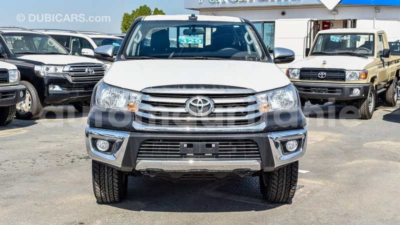 Big with watermark toyota hilux adrar import dubai 2103