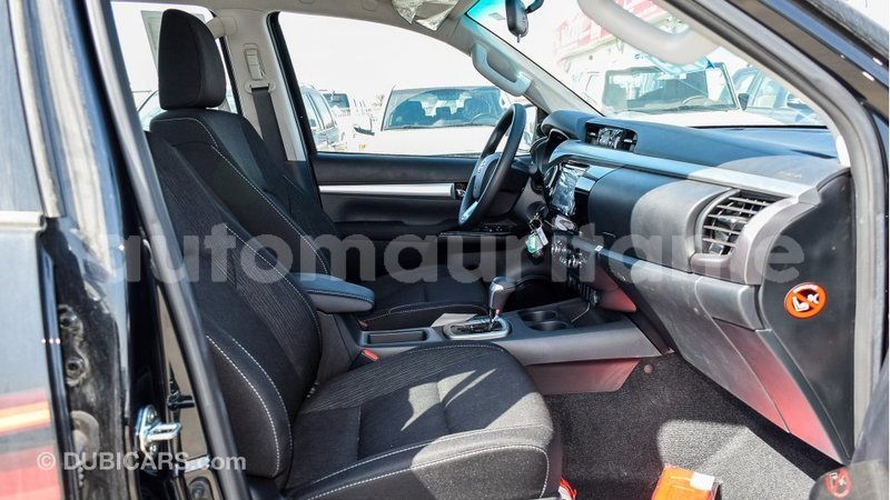 Big with watermark toyota hilux adrar import dubai 2103