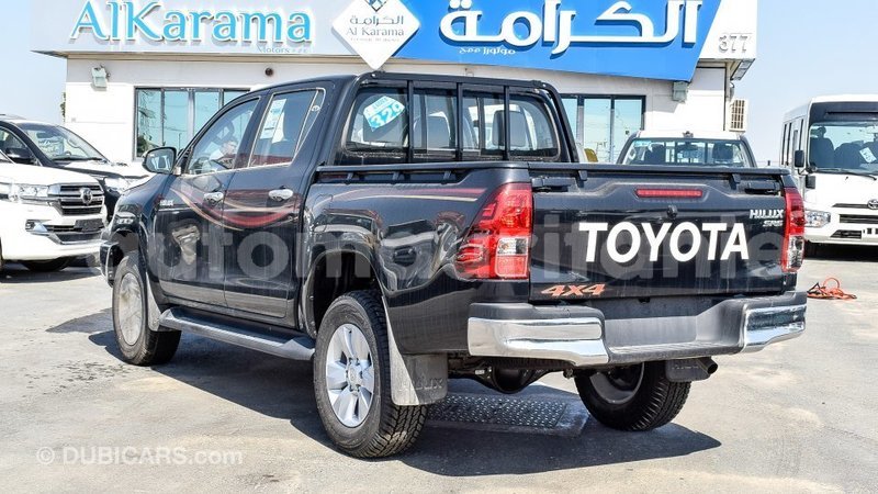 Big with watermark toyota hilux adrar import dubai 2103