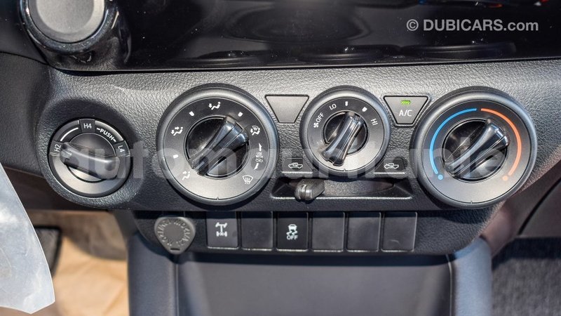 Big with watermark toyota hilux adrar import dubai 2104