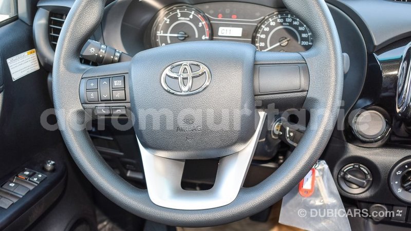 Big with watermark toyota hilux adrar import dubai 2104