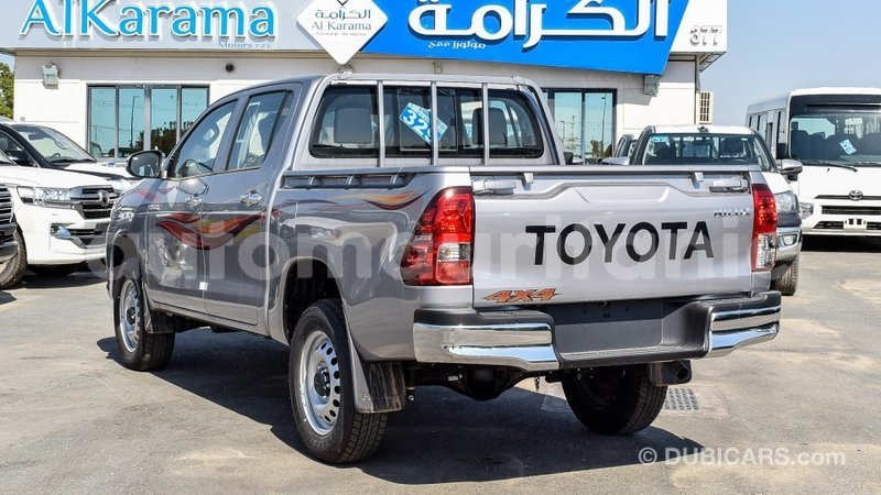Big with watermark toyota hilux adrar import dubai 2104