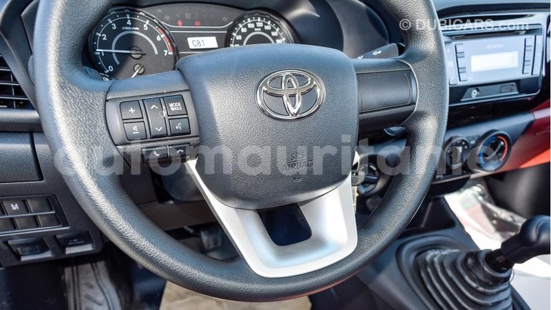 Big with watermark toyota hilux adrar import dubai 2106