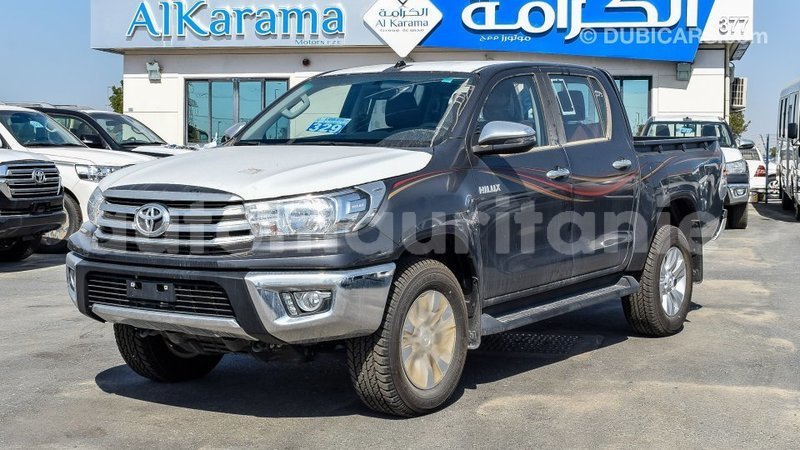 Big with watermark toyota hilux adrar import dubai 2107