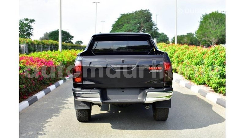 Big with watermark toyota hilux adrar import dubai 2115