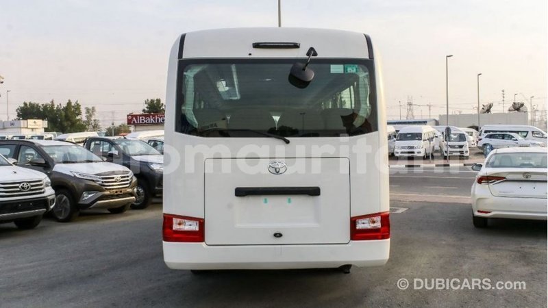 Big with watermark toyota coaster adrar import dubai 2304