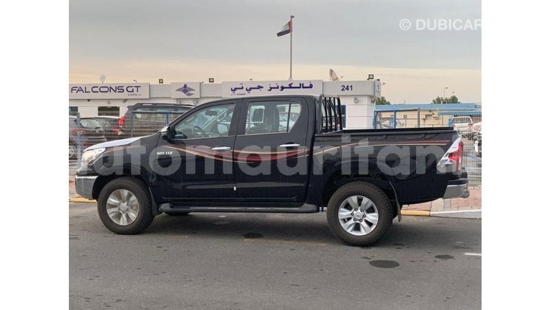 Big with watermark toyota hilux adrar import dubai 2410