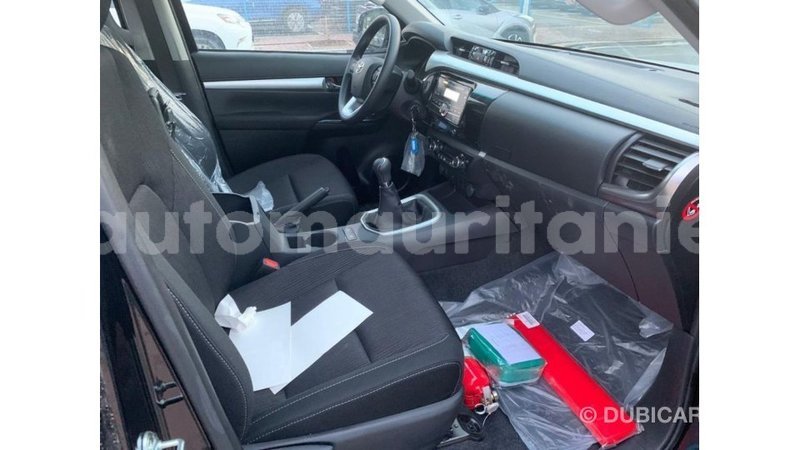 Big with watermark toyota hilux adrar import dubai 2410