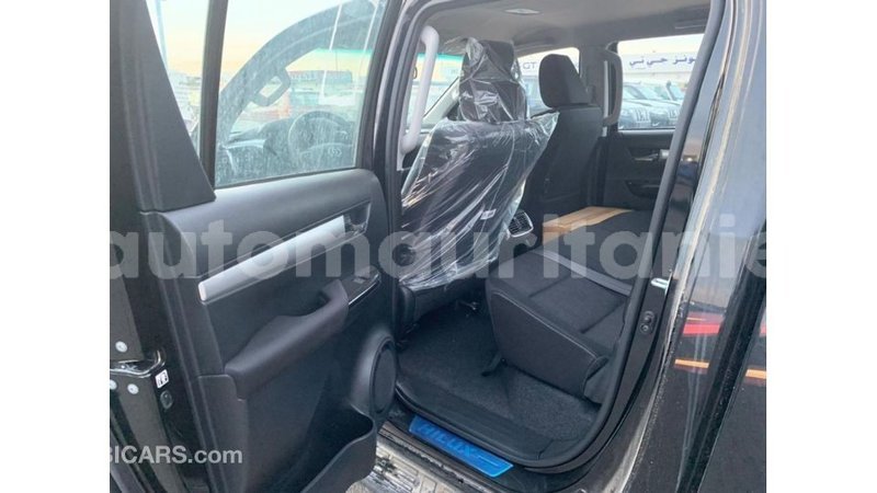 Big with watermark toyota hilux adrar import dubai 2410