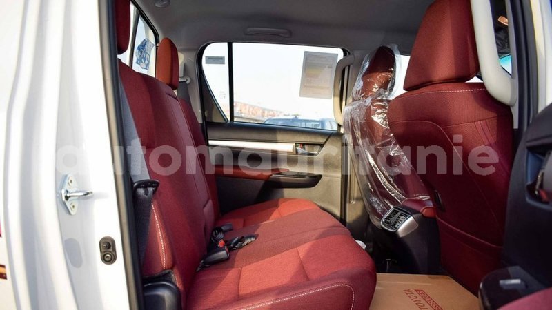 Big with watermark toyota hilux adrar import dubai 2700