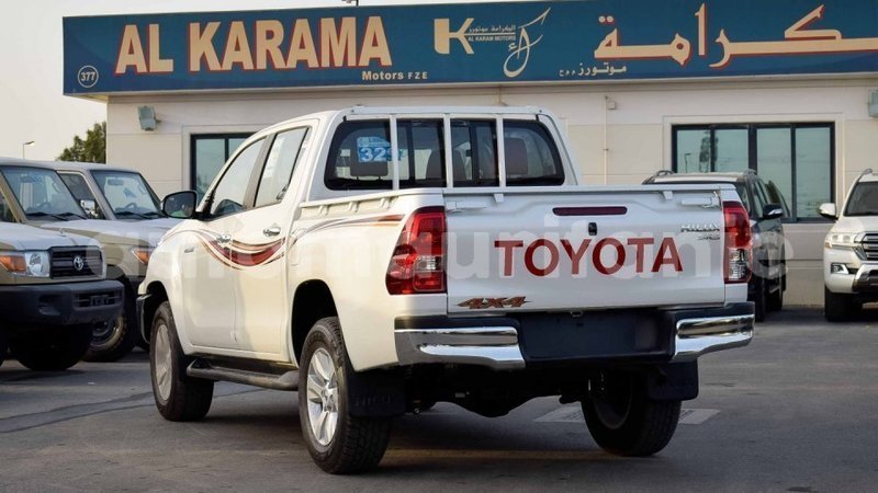 Big with watermark toyota hilux adrar import dubai 2700