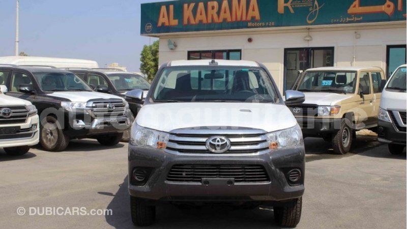 Big with watermark toyota hilux adrar import dubai 2702