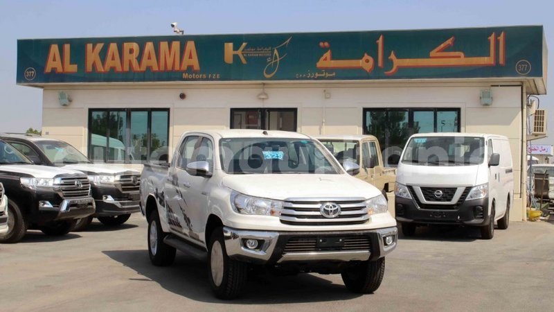 Big with watermark toyota hilux adrar import dubai 2716