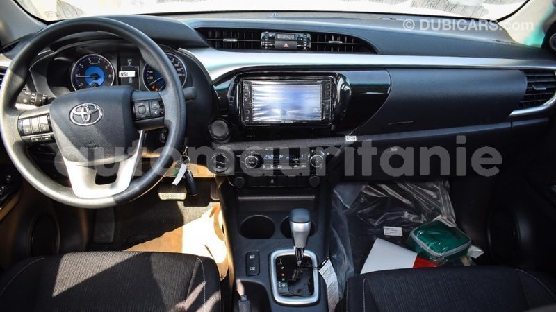 Big with watermark toyota hilux adrar import dubai 2721