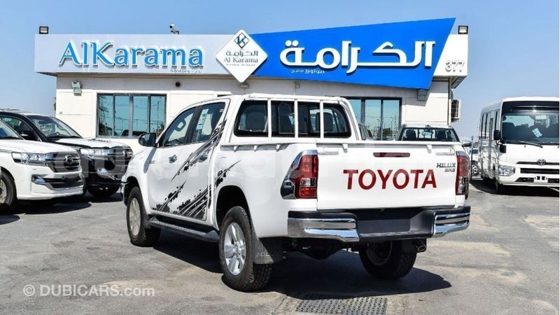 Big with watermark toyota hilux adrar import dubai 2748