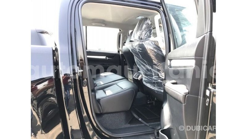 Big with watermark toyota hilux adrar import dubai 2806
