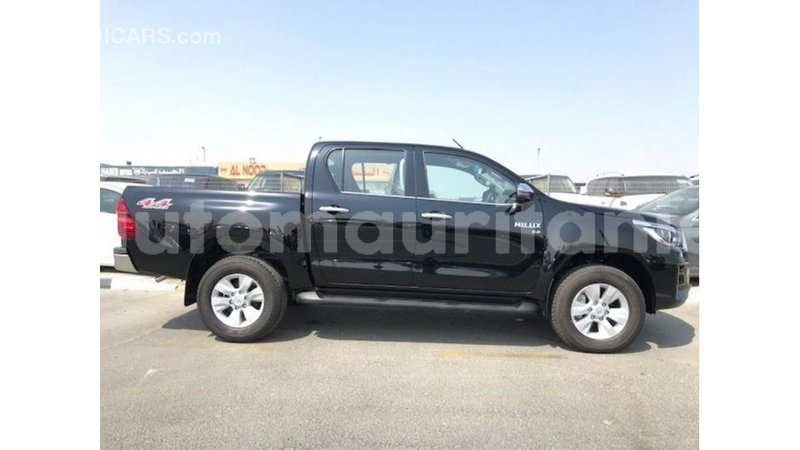 Big with watermark toyota hilux adrar import dubai 2806