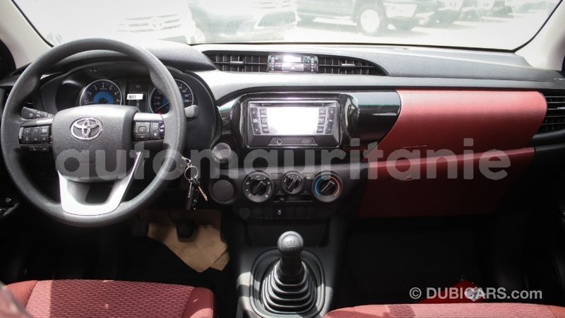 Big with watermark toyota hilux adrar import dubai 2899