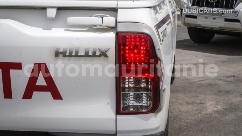 Big with watermark toyota hilux adrar import dubai 2899