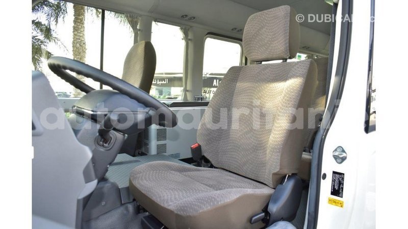 Big with watermark toyota coaster adrar import dubai 3288