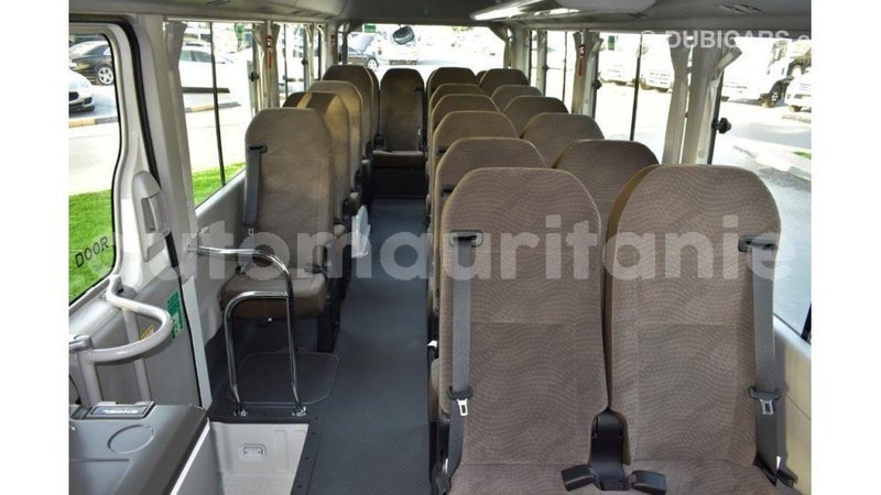 Big with watermark toyota coaster adrar import dubai 3288