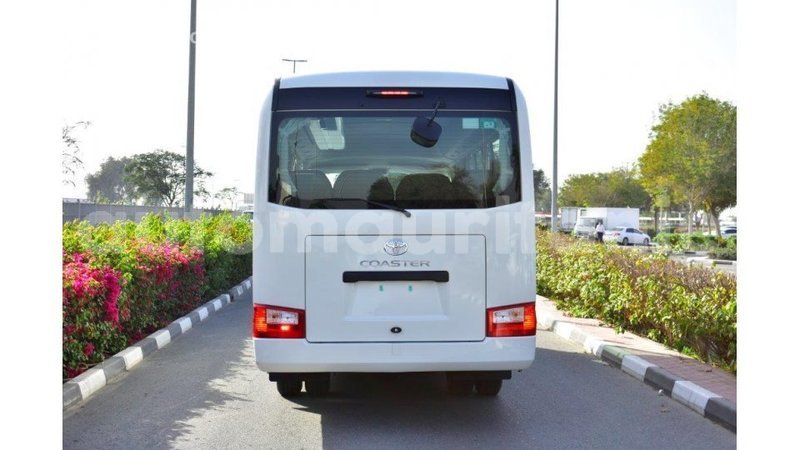 Big with watermark toyota coaster adrar import dubai 3288