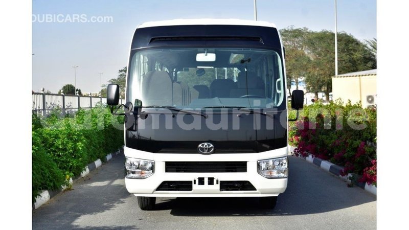 Big with watermark toyota coaster adrar import dubai 3378