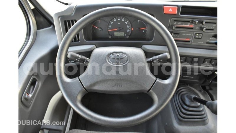 Big with watermark toyota coaster adrar import dubai 3378