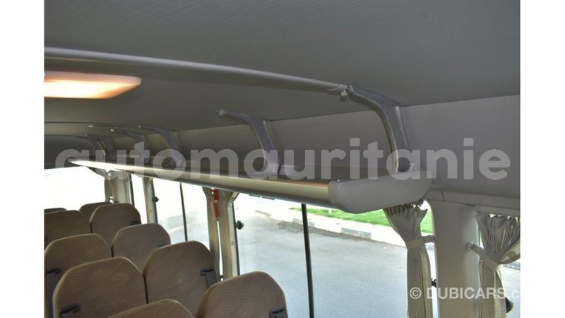 Big with watermark toyota coaster adrar import dubai 3378